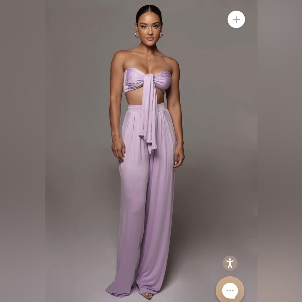 Lilac Tory two piece set. It runs big. This is for size 12 or 14.